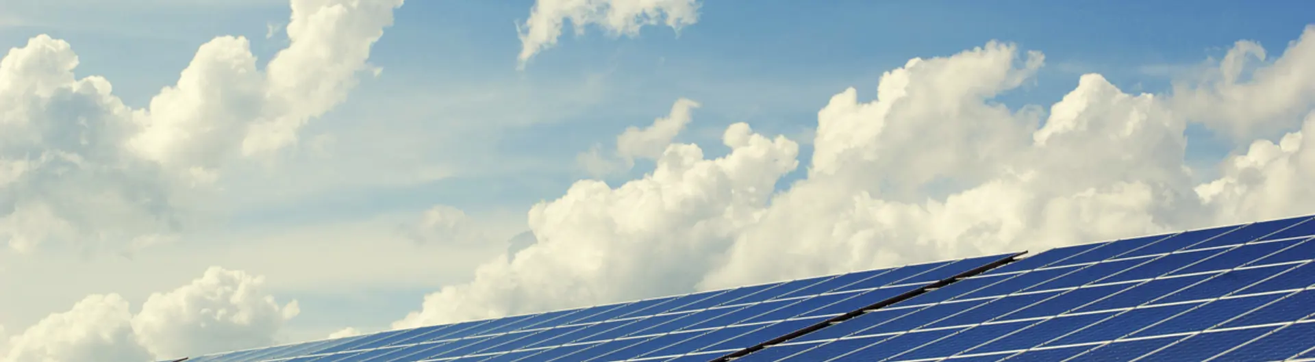 Solar panels with sky in background