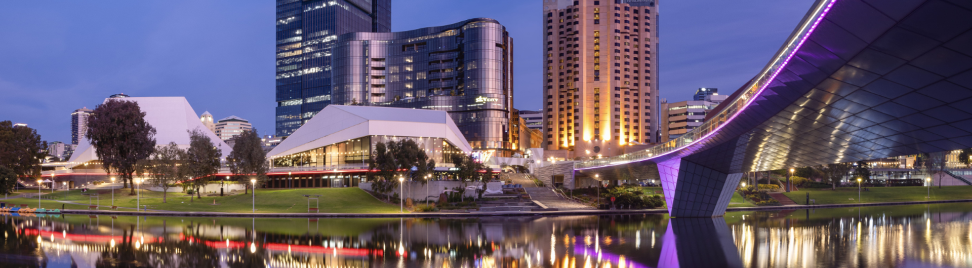 Bridge running over Adelaide River with skyline in the background