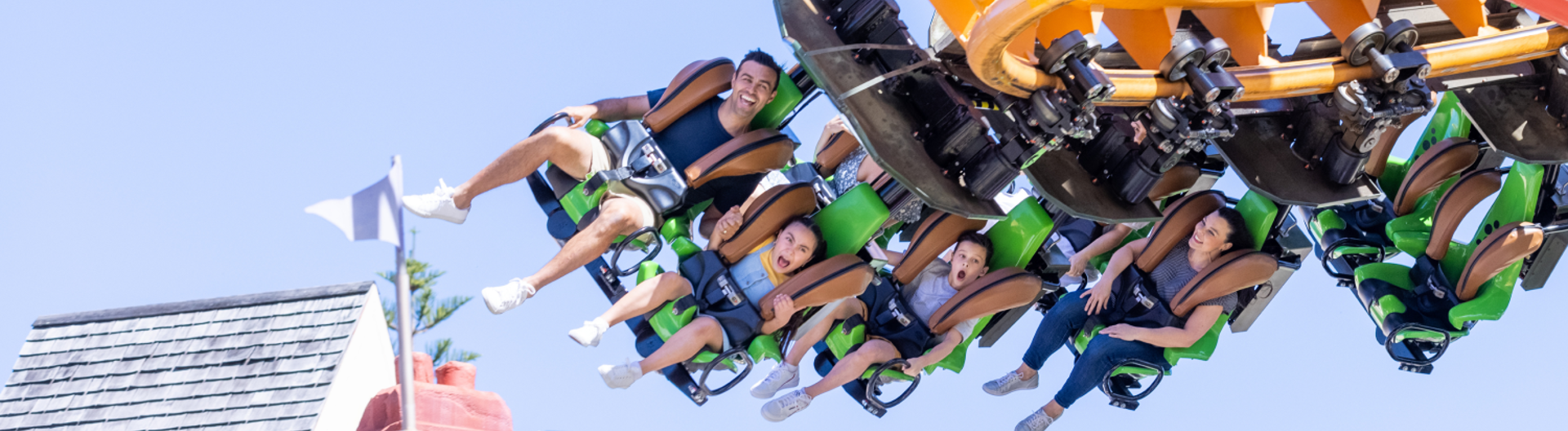 People on a rollercoaster at a Gold Coast theme park